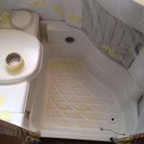 <strong>Before:</strong> Damaged shower tray